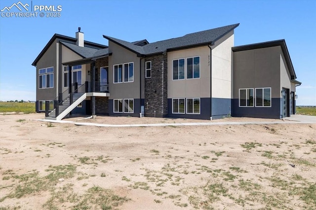 8545 Bailiff Dr, Peyton, CO 80831 - back of house with a chimney
