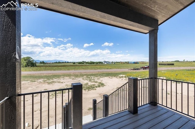 8545 Bailiff Dr, Peyton, CO 80831 - wooden terrace with a view of countryside