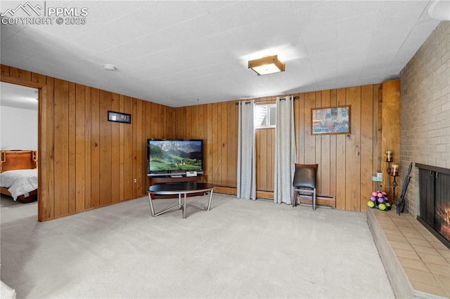 2206 Patrician Way, Colorado Springs, CO 80909 - carpeted living room with a fireplace and wooden walls