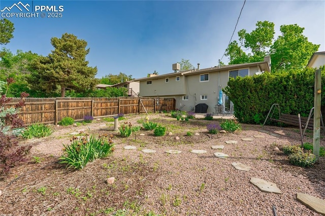 2206 Patrician Way, Colorado Springs, CO 80909 - back of house featuring stucco siding