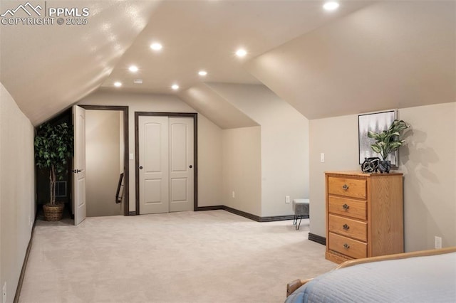 8395 Bar X Ter, Colorado Springs, CO 80908 - bedroom featuring light carpet, recessed lighting, lofted ceiling, and baseboards