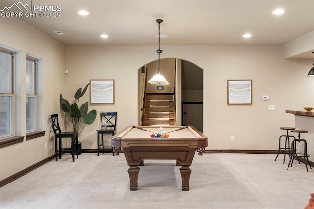 8395 Bar X Ter, Colorado Springs, CO 80908 - rec room with light carpet, billiards table, recessed lighting, arched walkways, and baseboards