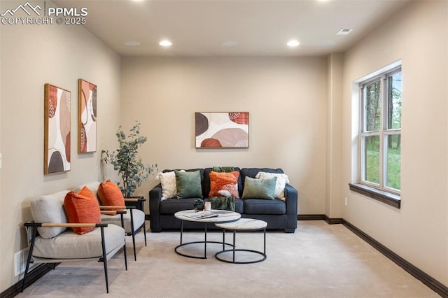 8395 Bar X Ter, Colorado Springs, CO 80908 - living area with light carpet, recessed lighting, and baseboards