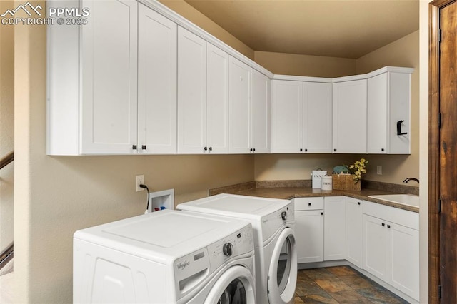 8395 Bar X Ter, Colorado Springs, CO 80908 - washroom featuring cabinet space, separate washer and dryer, and stone finish floors