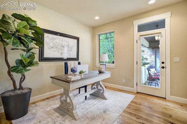 5085 Saxton Hollow Rd, Colorado Springs, CO 80908 - office area featuring wood finished floors and recessed lighting