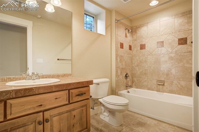5085 Saxton Hollow Rd, Colorado Springs, CO 80908 - full bath with vanity, shower / bathtub combination, and tile patterned floors
