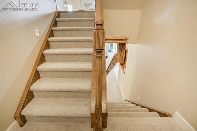 5085 Saxton Hollow Rd, Colorado Springs, CO 80908 - stairs featuring baseboards and carpet floors