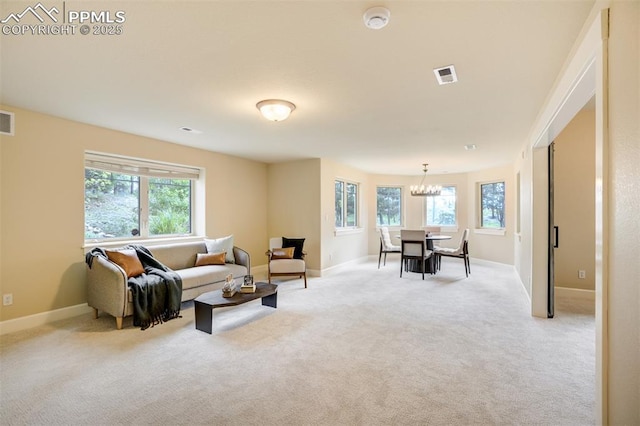 5085 Saxton Hollow Rd, Colorado Springs, CO 80908 - living area with a chandelier and light colored carpet