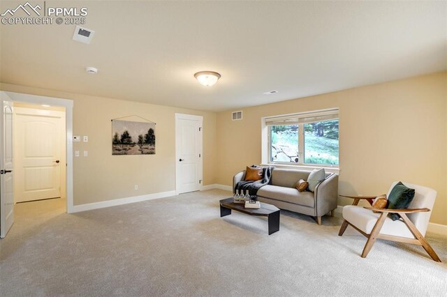 5085 Saxton Hollow Rd, Colorado Springs, CO 80908 - living area featuring light carpet and baseboards