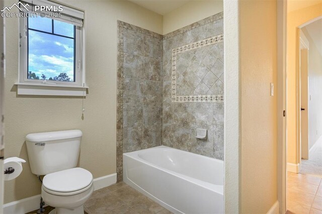 5085 Saxton Hollow Rd, Colorado Springs, CO 80908 - bathroom featuring tile patterned floors and bathing tub / shower combination