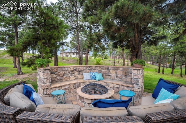 5085 Saxton Hollow Rd, Colorado Springs, CO 80908 - view of patio with an outdoor living space with a fire pit