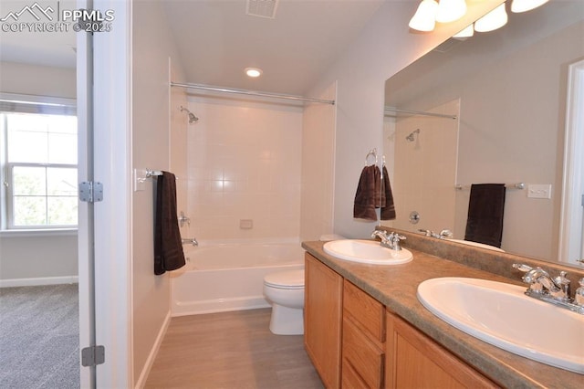 1160 Walters Pt, Monument, CO 80132 - full bath with shower / tub combination, double vanity, toilet, recessed lighting, and baseboards