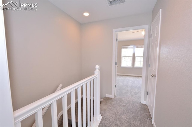 1160 Walters Pt, Monument, CO 80132 - corridor with an upstairs landing, carpet flooring, recessed lighting, and baseboards
