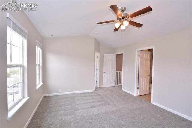 1160 Walters Pt, Monument, CO 80132 - carpeted empty room with vaulted ceiling, baseboards, and a ceiling fan