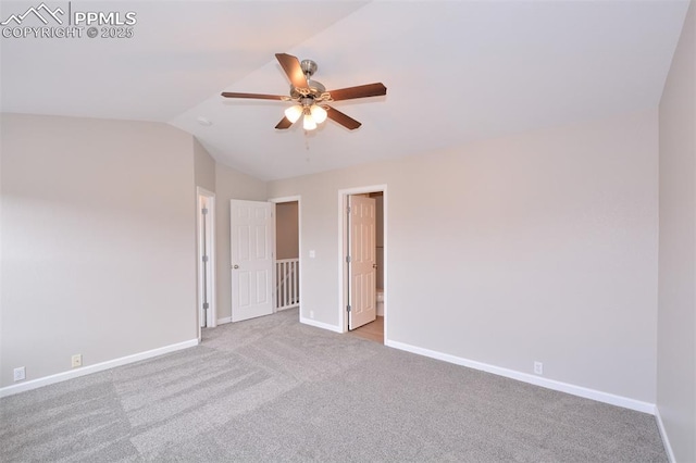 1160 Walters Pt, Monument, CO 80132 - empty room featuring a ceiling fan, lofted ceiling, baseboards, and light carpet
