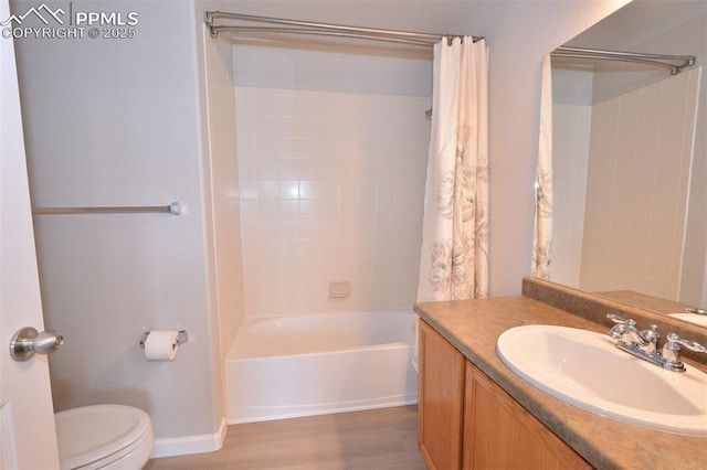 1160 Walters Pt, Monument, CO 80132 - bathroom with toilet, vanity, shower / bath combination with curtain, wood finished floors, and baseboards