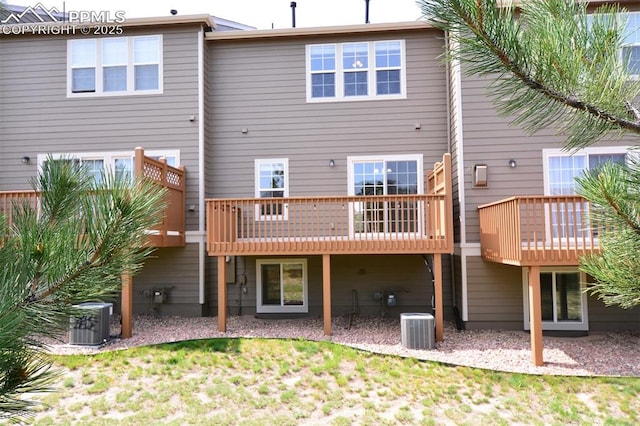 1160 Walters Pt, Monument, CO 80132 - rear view of house with central AC unit and a deck