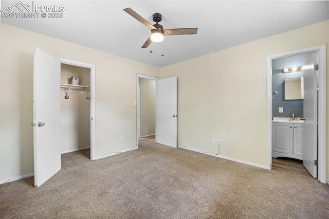 305 Rosewood Dr, Fountain, CO 80817 - unfurnished bedroom with carpet floors, baseboards, ensuite bathroom, and a closet