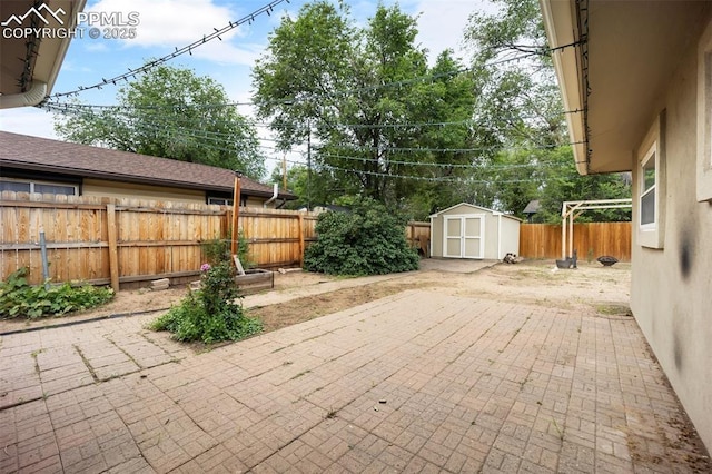 305 Rosewood Dr, Fountain, CO 80817 - fenced backyard with a patio area