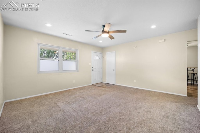 305 Rosewood Dr, Fountain, CO 80817 - carpeted spare room with ceiling fan, baseboards, and recessed lighting