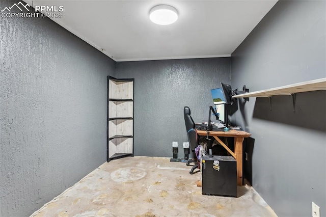 2123 Kodiak Dr, Colorado Springs, CO 80910 - office area featuring concrete flooring and a textured wall