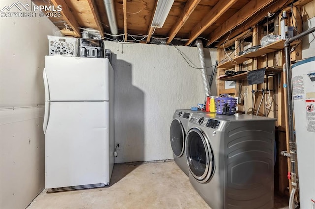 2123 Kodiak Dr, Colorado Springs, CO 80910 - washroom with separate washer and dryer and water heater