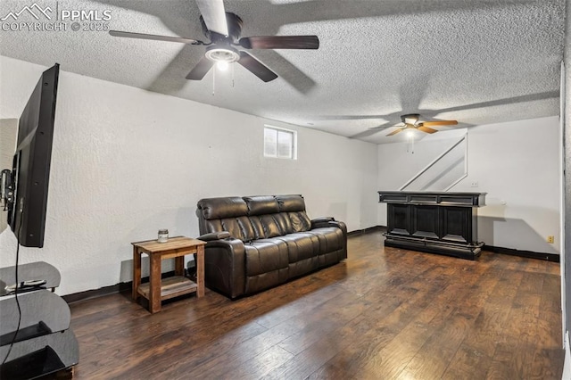 2123 Kodiak Dr, Colorado Springs, CO 80910 - living area featuring a ceiling fan, hardwood / wood-style floors, a textured ceiling, and baseboards