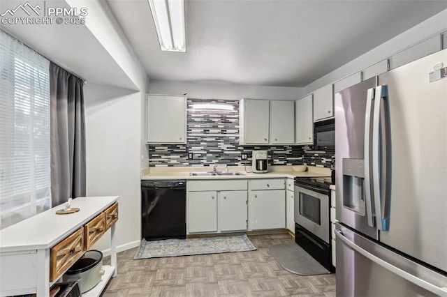 2123 Kodiak Dr, Colorado Springs, CO 80910 - kitchen featuring black appliances, a sink, healthy amount of natural light, and light countertops