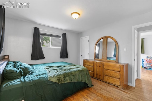 1513 Rosemont Dr, Colorado Springs, CO 80911 - bedroom featuring light wood-style floors and baseboards