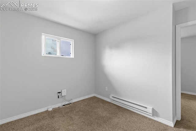 1513 Rosemont Dr, Colorado Springs, CO 80911 - carpeted empty room featuring a baseboard heating unit and baseboards