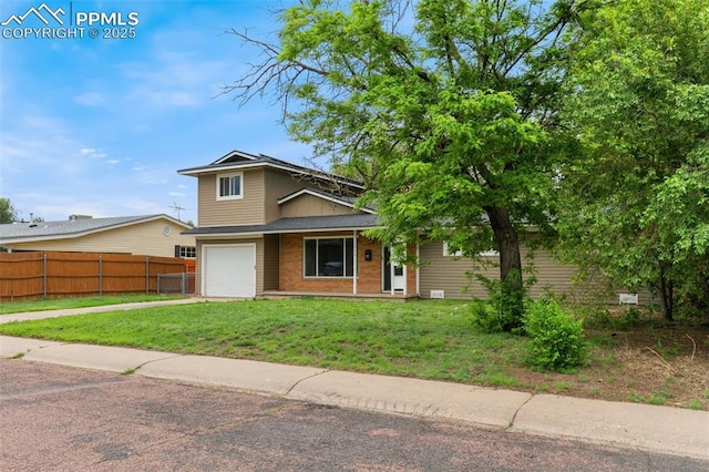 1513 Rosemont Dr, Colorado Springs, CO 80911 - view of front of property with a garage and concrete driveway