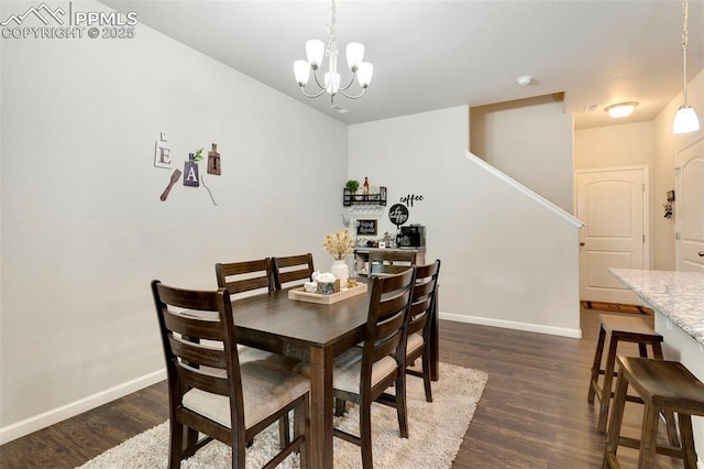 2001 Birmingham Loop, Colorado Springs, CO 80910 - dining room featuring baseboards, dark wood-style floors, a chandelier, and stairway