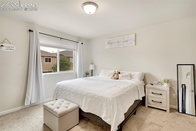 2001 Birmingham Loop, Colorado Springs, CO 80910 - bedroom with light carpet and baseboards