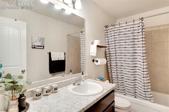 2001 Birmingham Loop, Colorado Springs, CO 80910 - bathroom featuring vanity, toilet, and shower / bath combo with shower curtain