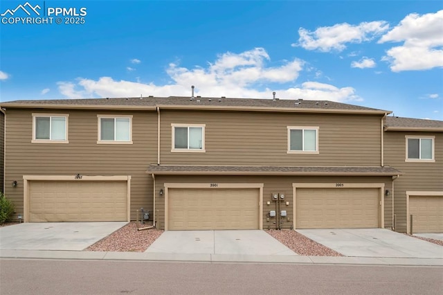 2001 Birmingham Loop, Colorado Springs, CO 80910 - multi unit property featuring an attached garage and driveway