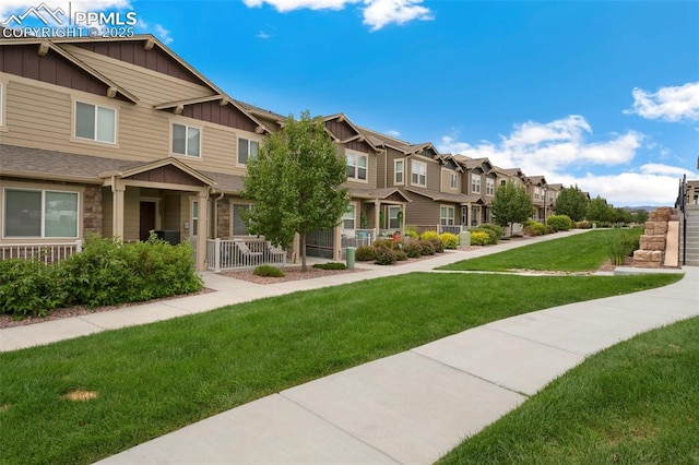 2001 Birmingham Loop, Colorado Springs, CO 80910 - view of property's community featuring a residential view and a lawn