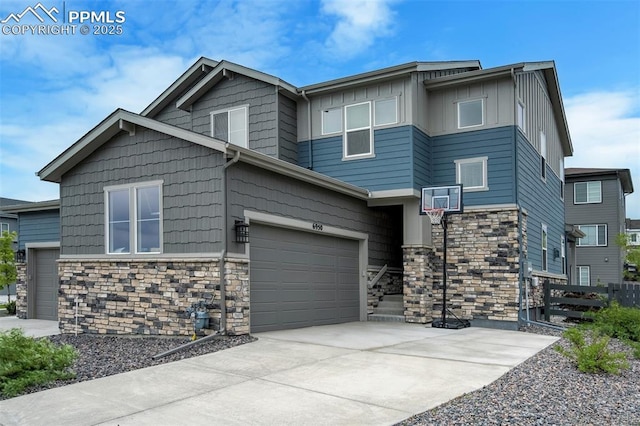 6950 Hidden Cove Ct, Castle Pines, CO 80108 - view of front of property with stone siding, board and batten siding, concrete driveway, and an attached garage