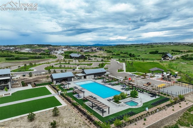 6950 Hidden Cove Ct, Castle Pines, CO 80108 - drone / aerial view of a pool area