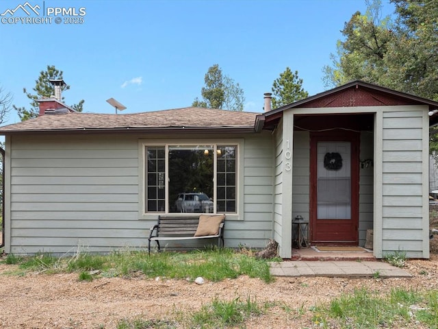 103 Alpine Rd, Woodland Park, CO 80863 - view of front of house featuring roof with shingles