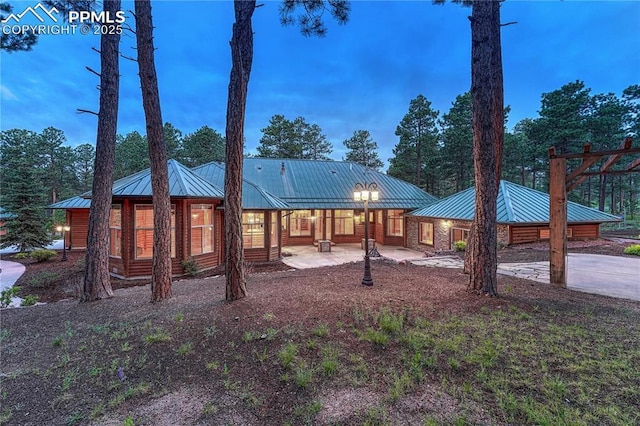 15975 Winding Trail Rd, Colorado Springs, CO 80908 - view of front of property featuring a standing seam roof and a metal roof