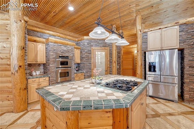 15975 Winding Trail Rd, Colorado Springs, CO 80908 - kitchen with appliances with stainless steel finishes, wood ceiling, inlaid floor details, tile countertops, and a center island