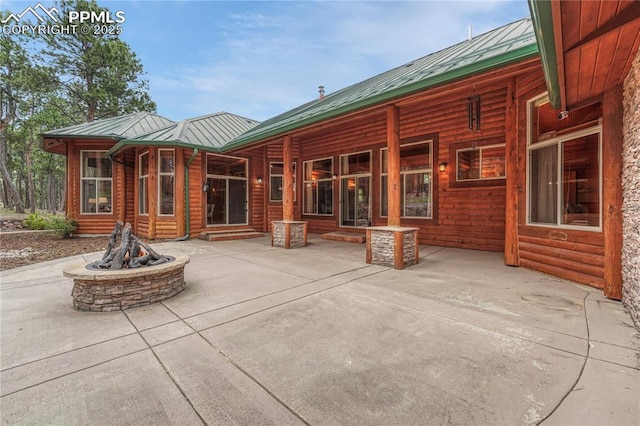 15975 Winding Trail Rd, Colorado Springs, CO 80908 - view of patio featuring a fire pit