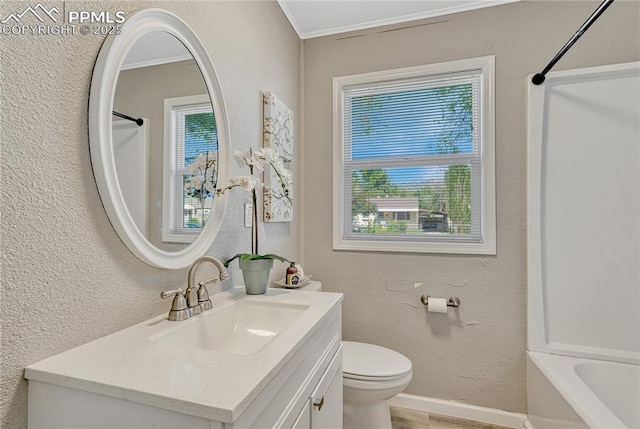 1917 S Institute Ave, Colorado Springs, CO 80905 - bathroom featuring vanity, plenty of natural light, ornamental molding, shower / bath combination with curtain, and a textured wall