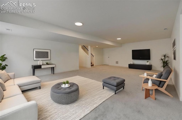 9276 Glitter Way, Colorado Springs, CO 80924 - carpeted living room with stairway and recessed lighting