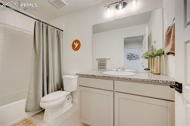 9276 Glitter Way, Colorado Springs, CO 80924 - bathroom with toilet, vanity, tile patterned floors, and shower / bath combo