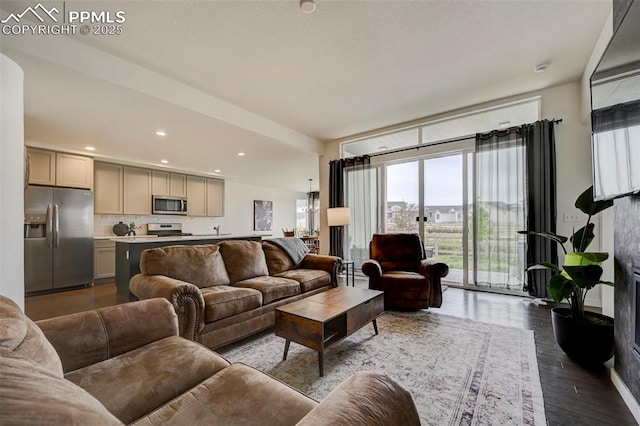 9276 Glitter Way, Colorado Springs, CO 80924 - living area with wood finished floors and recessed lighting