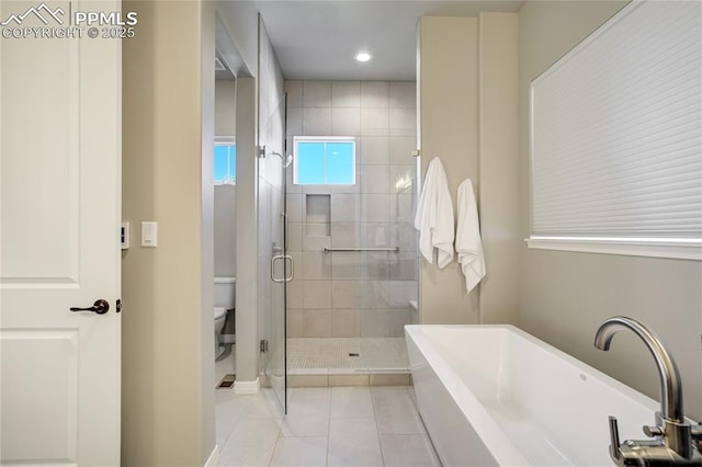 11598 Silver Charm Way, Colorado Springs, CO 80921 - bathroom with a freestanding tub, a stall shower, tile patterned floors, and recessed lighting