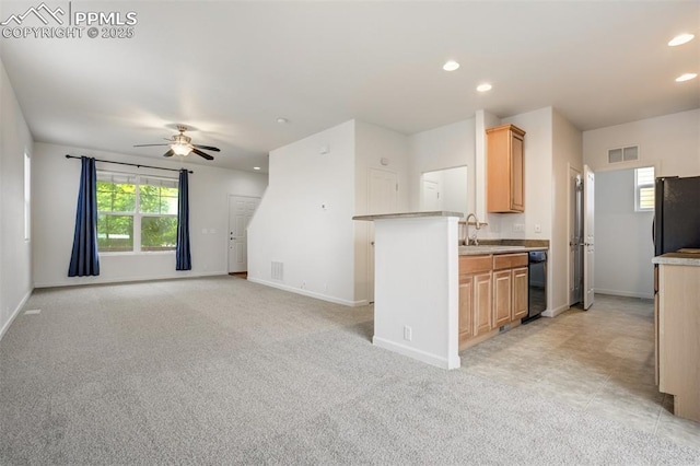 7689 Sniktau Pt, Peyton, CO 80831 - kitchen with black appliances, ceiling fan, recessed lighting, light brown cabinetry, and baseboards