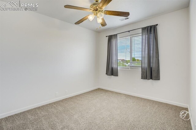 7689 Sniktau Pt, Peyton, CO 80831 - carpeted empty room featuring baseboards and a ceiling fan