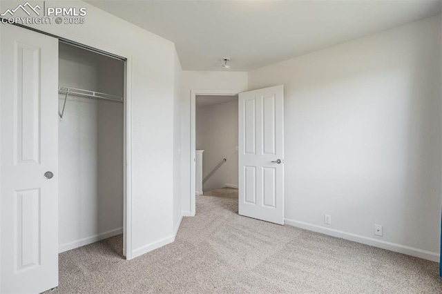 7689 Sniktau Pt, Peyton, CO 80831 - unfurnished bedroom featuring carpet floors, baseboards, and a closet